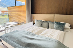 Schlafzimmer-im-Das-Paradies-mit-komfortablen-Betten